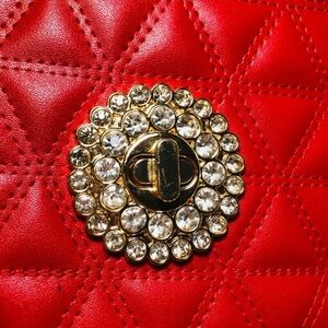 Red evening bag. Long gold strap